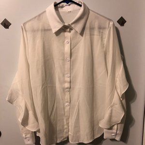 White long sleeve button up with ruffles along sleeves